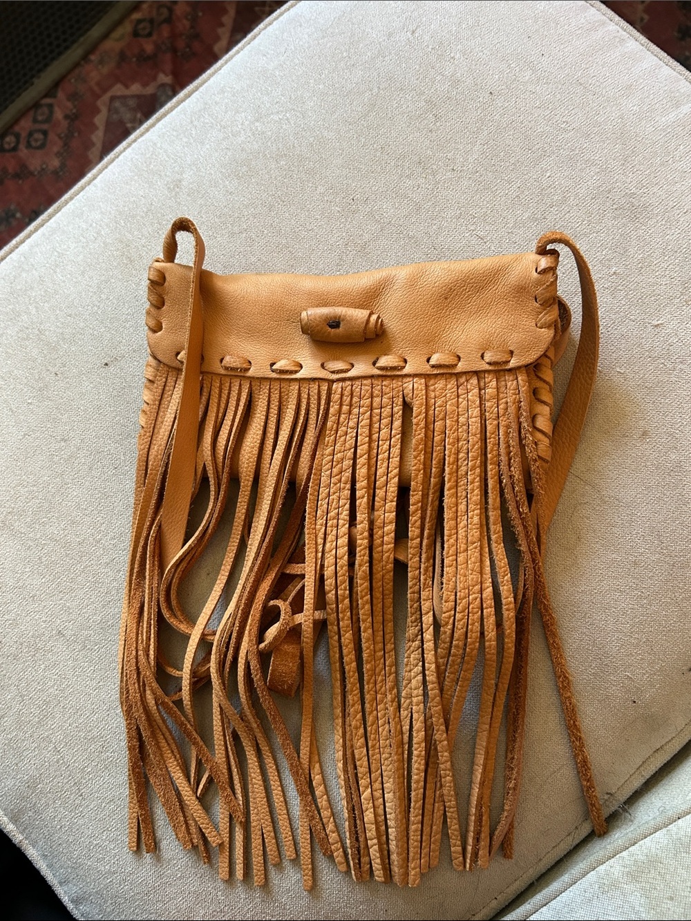 Fringed Leather Crossbody Bag in Tan